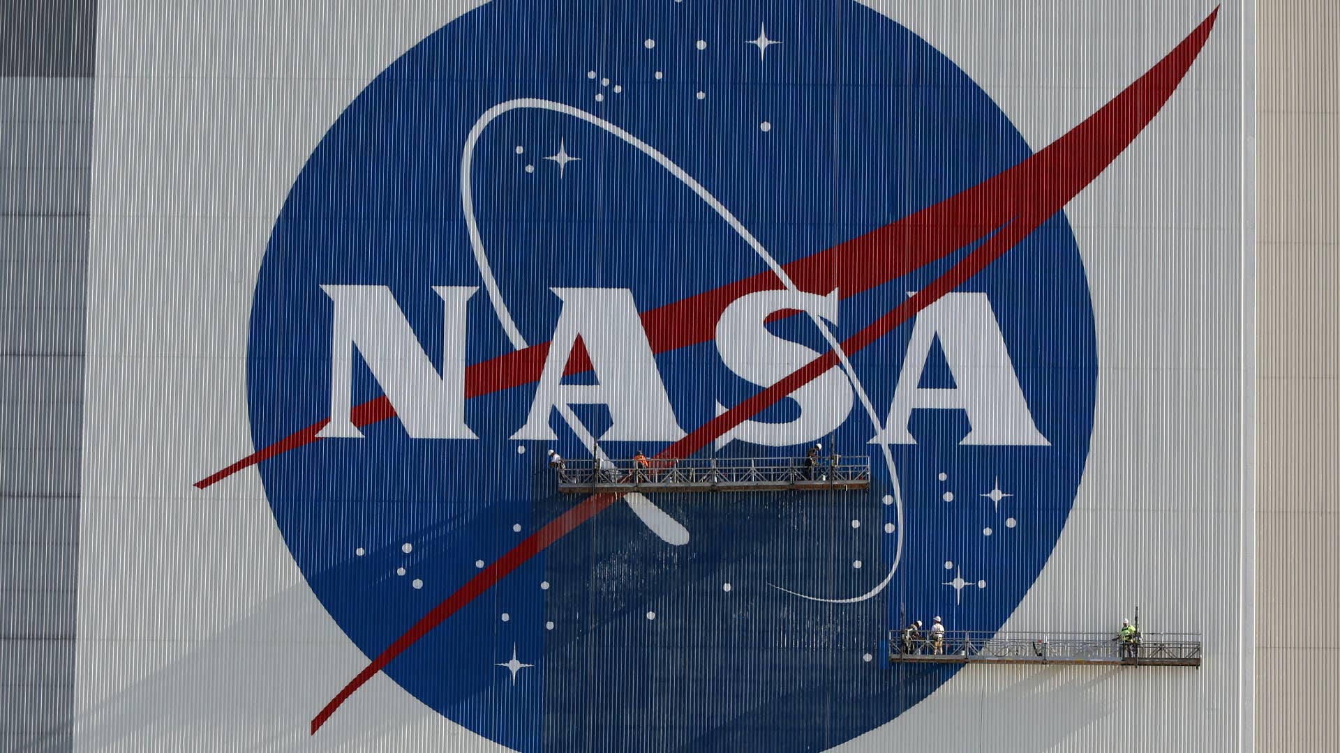 A logo for the NASA agency is shown.