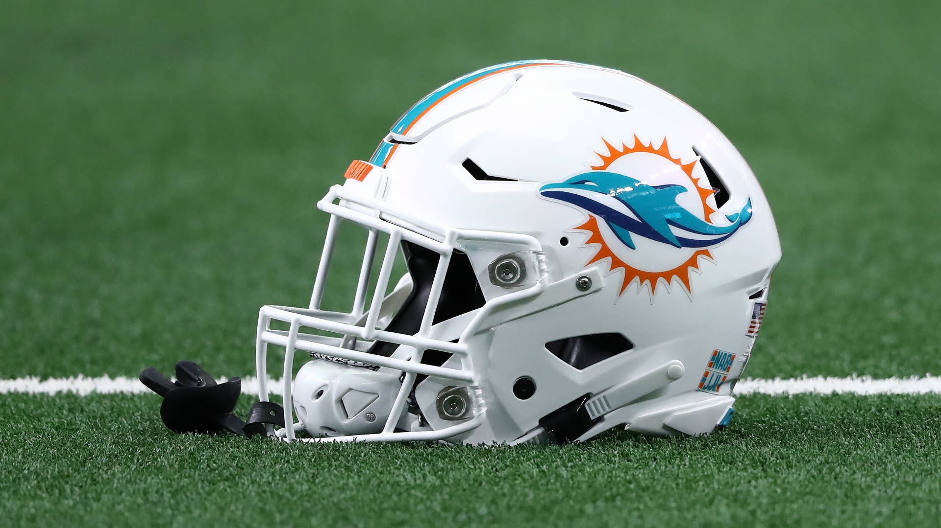 A Miami Dolphins helmet on the field.