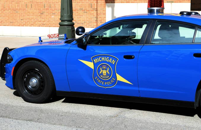 Michigan State Police vehicle sits parked outside Comerica Park in Detroit
