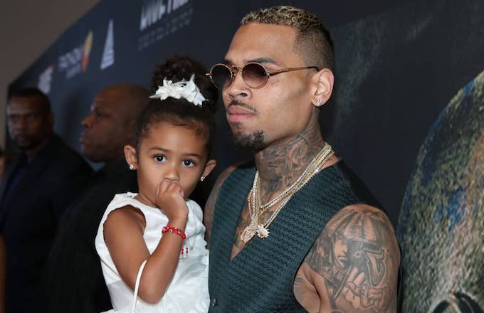 Singer Chris Brown (R) and his daughter Royalty