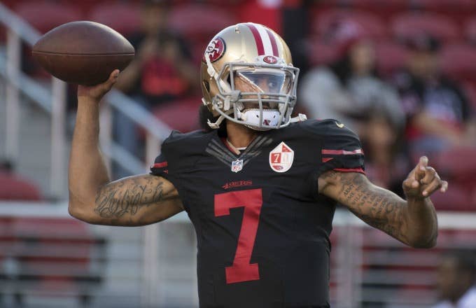 Colin Kaepernick throws a pass during a preseason game.