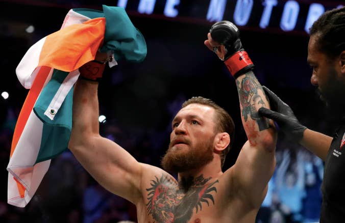 Conor McGregor celebrates after defeating Donald Cerrone