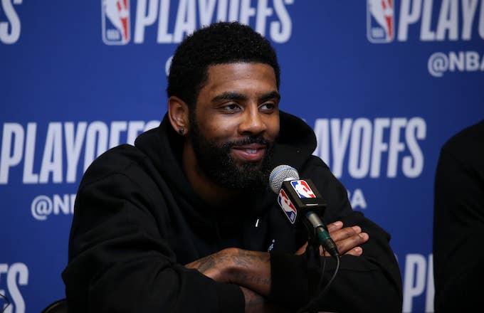 Kyrie Irving smiles at the press conference after Game One of the Eastern Conference Semifinals.