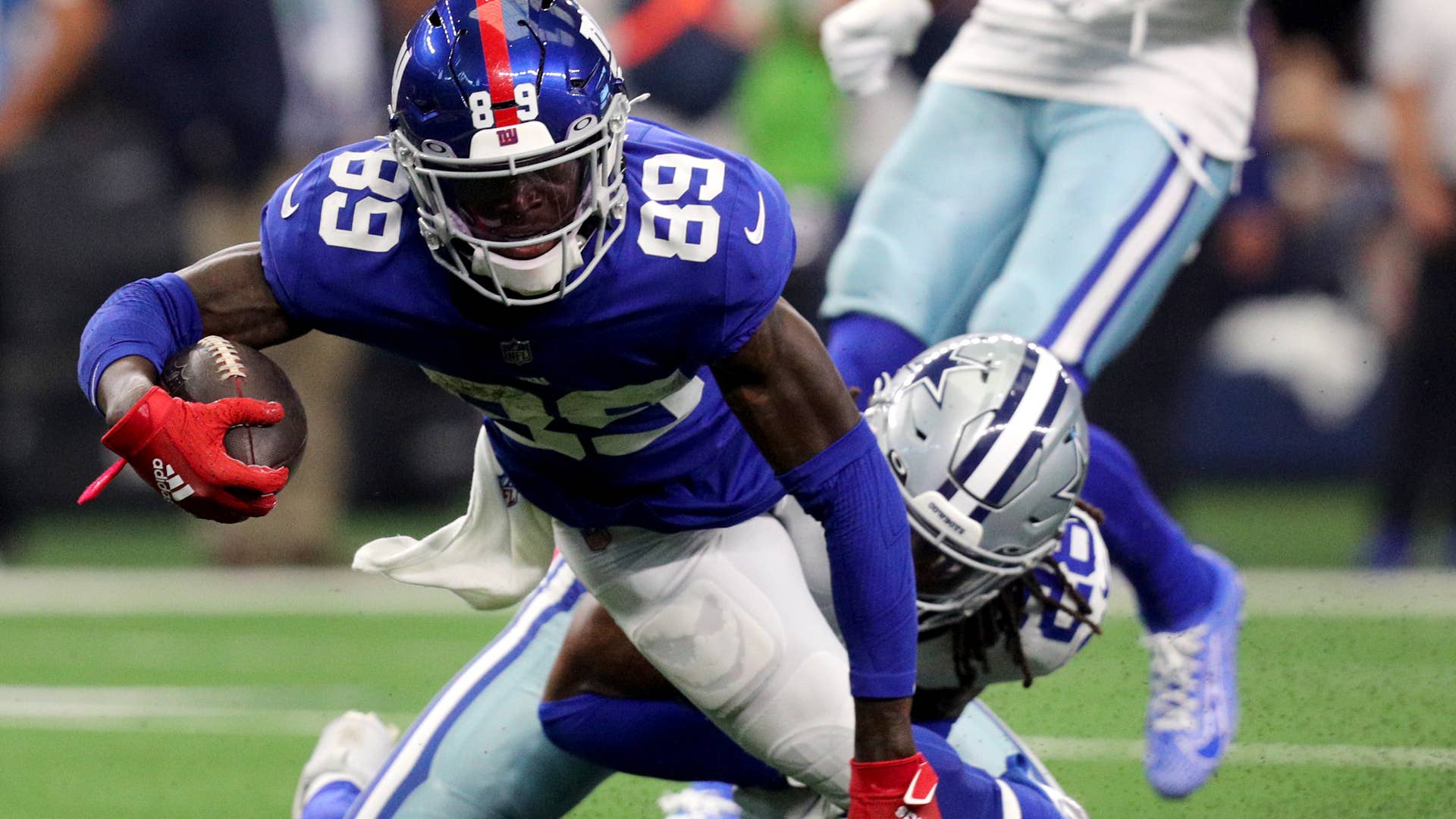 Kadarius Toney of the Giants tackled during game against the Cowboys
