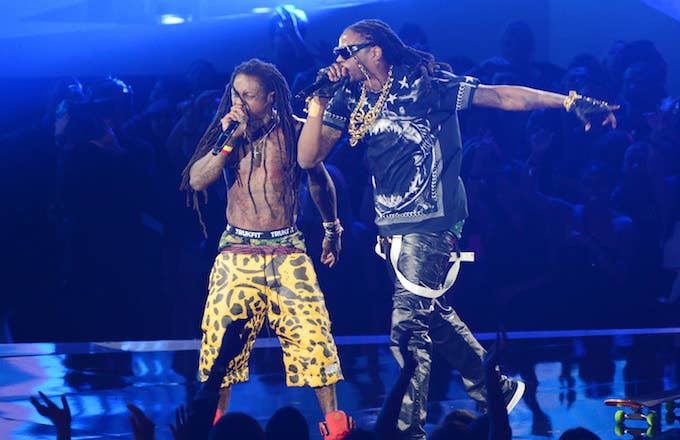 2 Chainz and Lil Wayne performing.