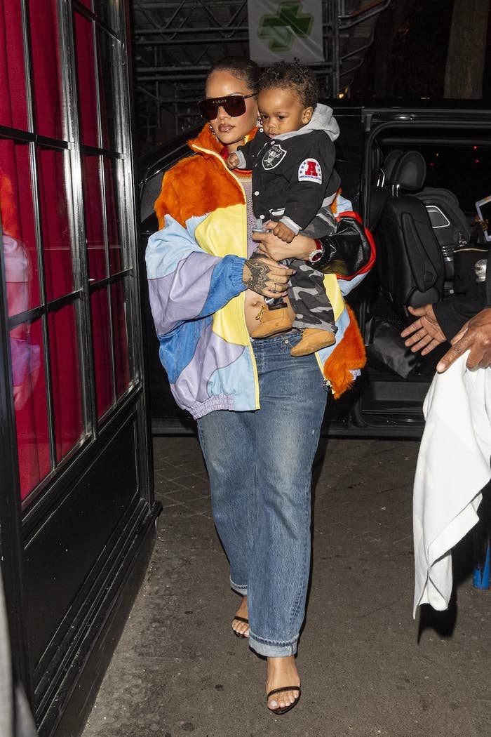 Rihanna shows off her stunning legs in nothing but a camo cardigan and a Louis  Vuitton purse