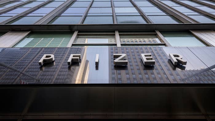 A logo for Pfizer is shown on a building