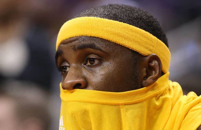 Ty Lawson sits on the bench.