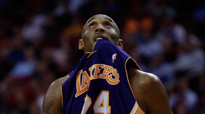 Kobe Bryant #24 of the Los Angeles Lakers looks up to the scoreboard