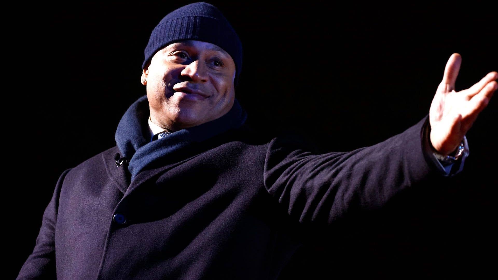 LL Cool J onstage at the 99th National Christmas Tree Lighting Ceremony in President's Park near The White House