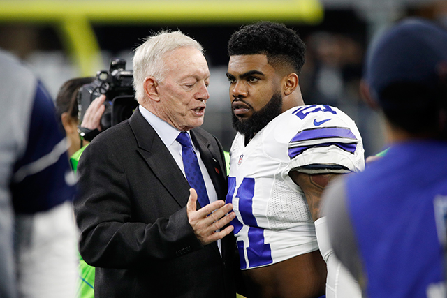 Dallas Cowboys owner Jerry Jones talks with Ezekiel Elliott