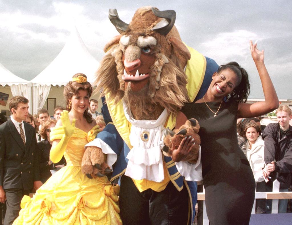 Performers in Beauty and the Beast costumes