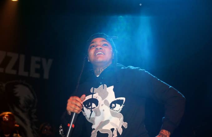 Young M.A performs.