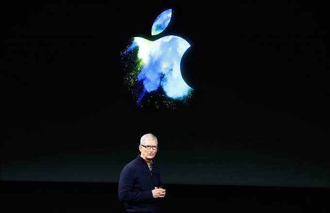 Tim Cook speaks on stage during an Apple product launch event