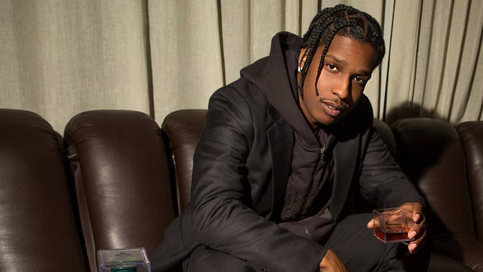 ASAP Rocky is seen holding a glass of his new whisky