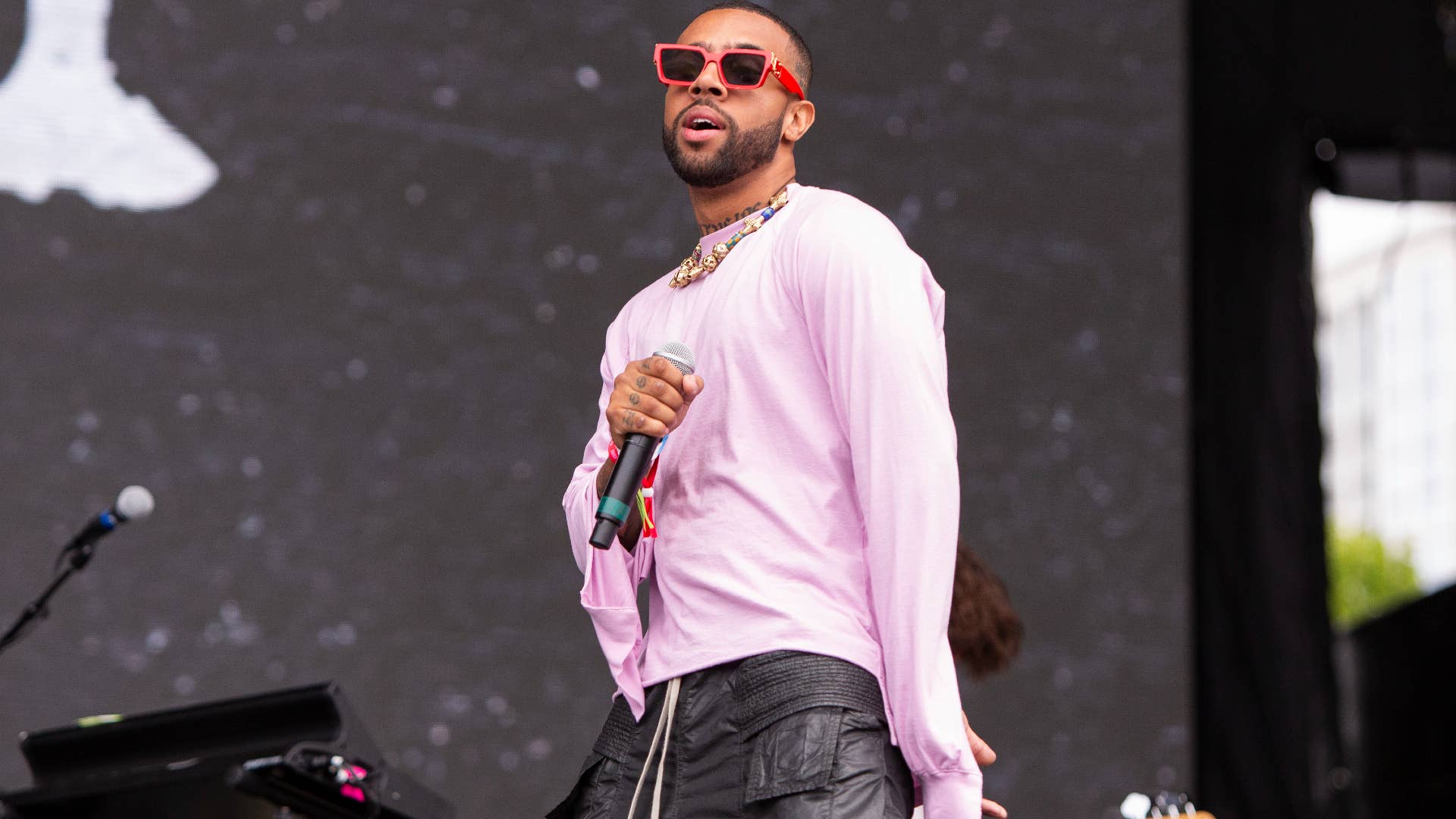 Vic Mensa is pictured performing at a festival