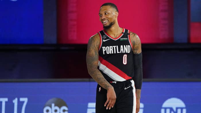 Damian Lillard smiles and celebrates after the Western Conference Play in Game.