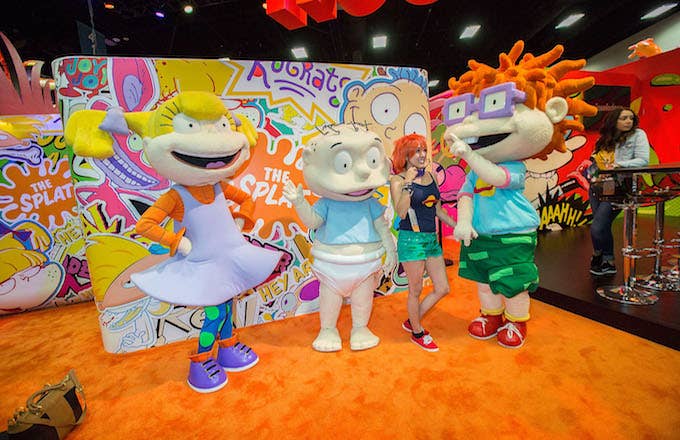 Fans pose for photos with characters from Nickelodeon&#x27;s &#x27;Rugrats&#x27; cartoon.