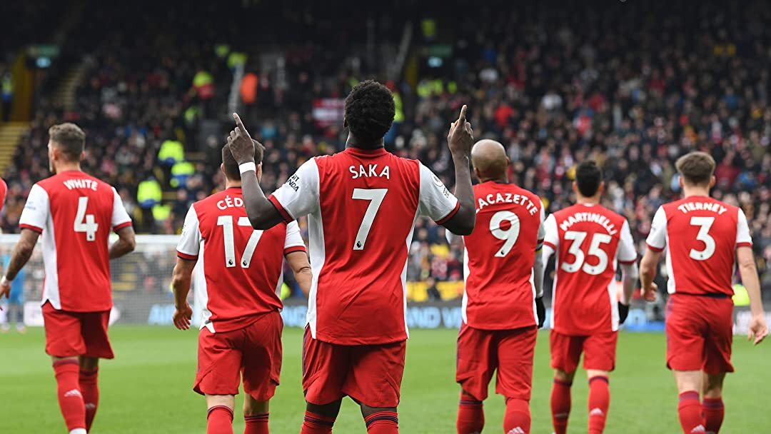 A soccer team in red jerseys.