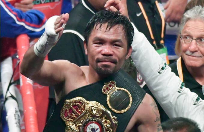 Manny Pacquiao waves to his fans after going 12 rounds