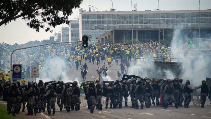 Supporters of former Brazilian President Bolsonaro clash with law enforcement officers