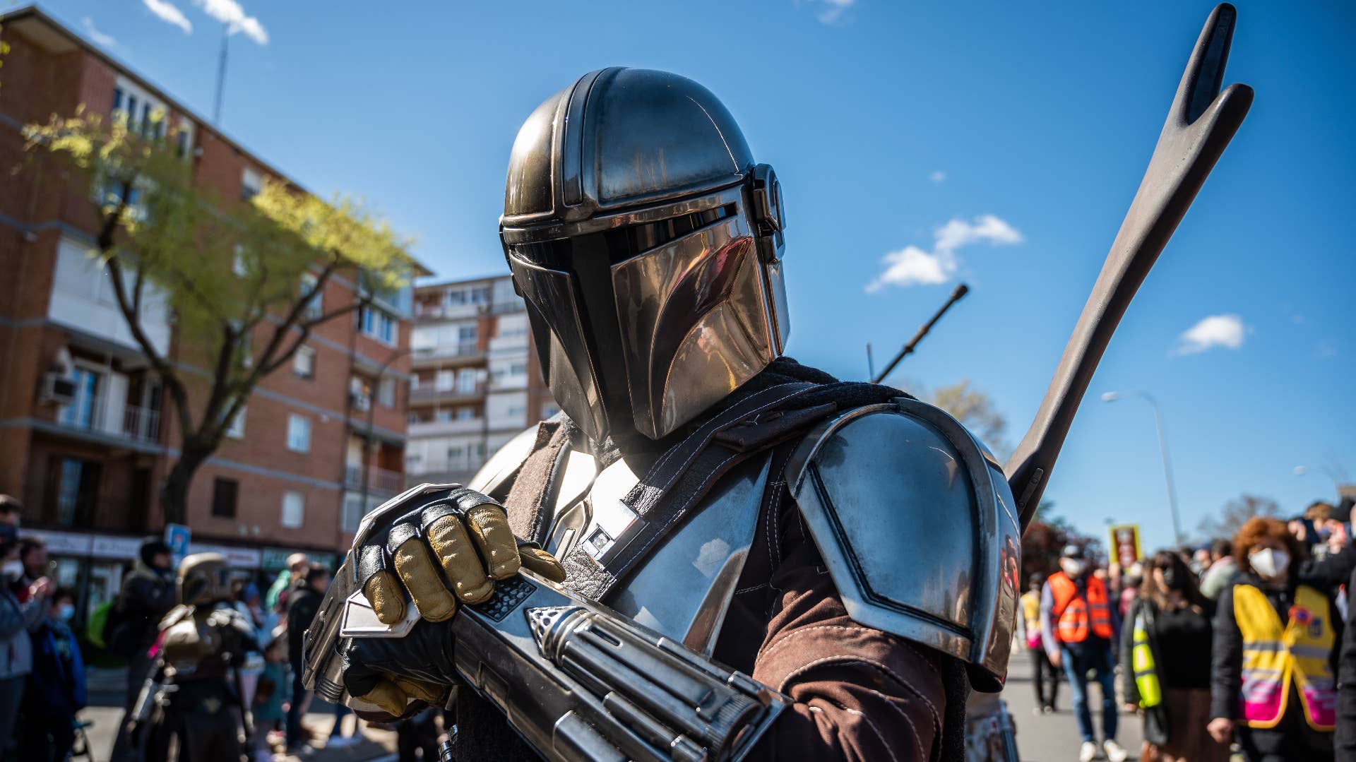 A man dressed as the Mandalorian during a Star Wars Parade.