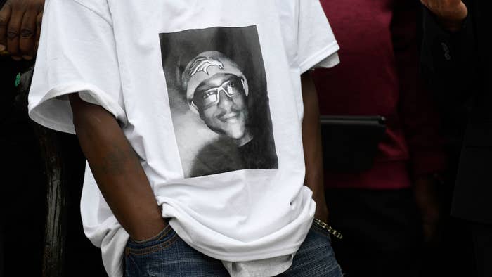 LaWayne Mosley, father of Elijah McClain, wears a t shirt with is son&#x27;s picture on it.