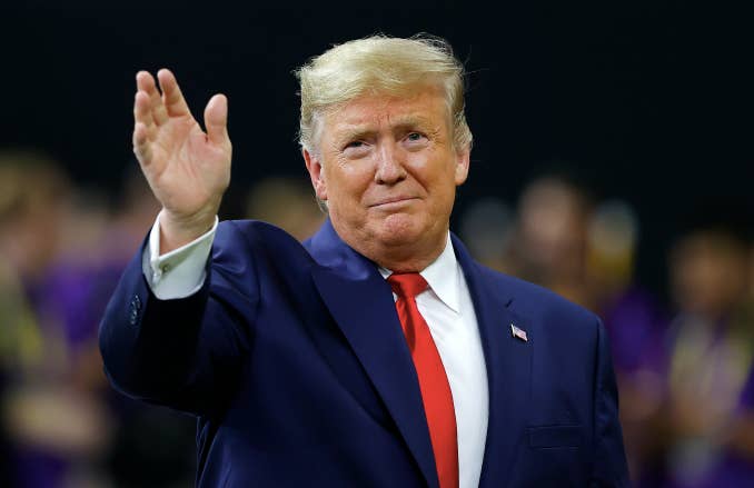 U.S. President Donald Trump waves prior to the College Football Playoff National Championship