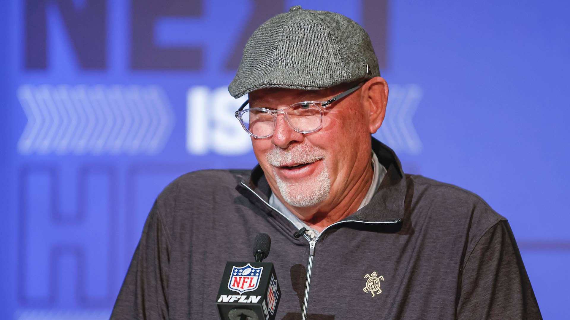 Bruce Arians, head coach of the Tampa Bay Buccaneers speaks to reporters .