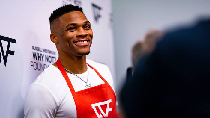 Russell Westbrook #0 of the Houston Rockets speaks to media before The Russell Westbrook Why Not? Foundation Thanksgiving Dinner