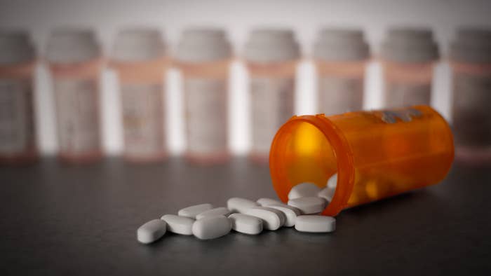 Prescription medication is strewn about