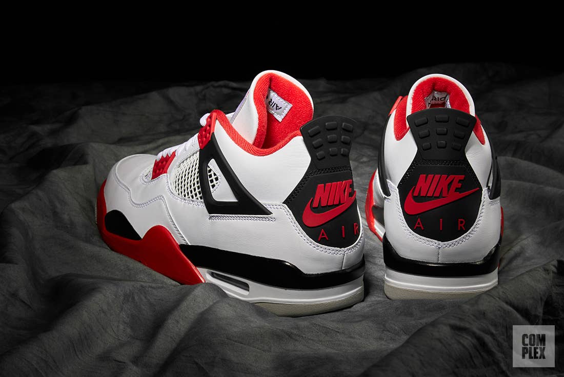 Michael Jordan wearing Fire Red Nike Air Jordan 5 (V