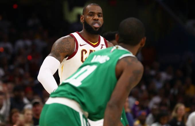 LeBron James looks at Kyrie Irving.