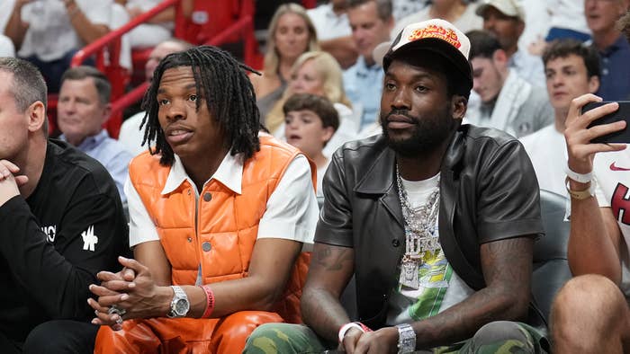 Lil Baby and Meek Mill attend a game between the Philadelphia 76ers and the Miami Heat