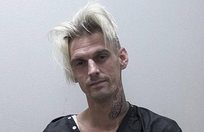 Singer Aaron Carter poses for his booking photo