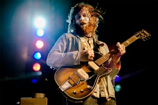 Dan Auerbach Playing the Guitar on Stage