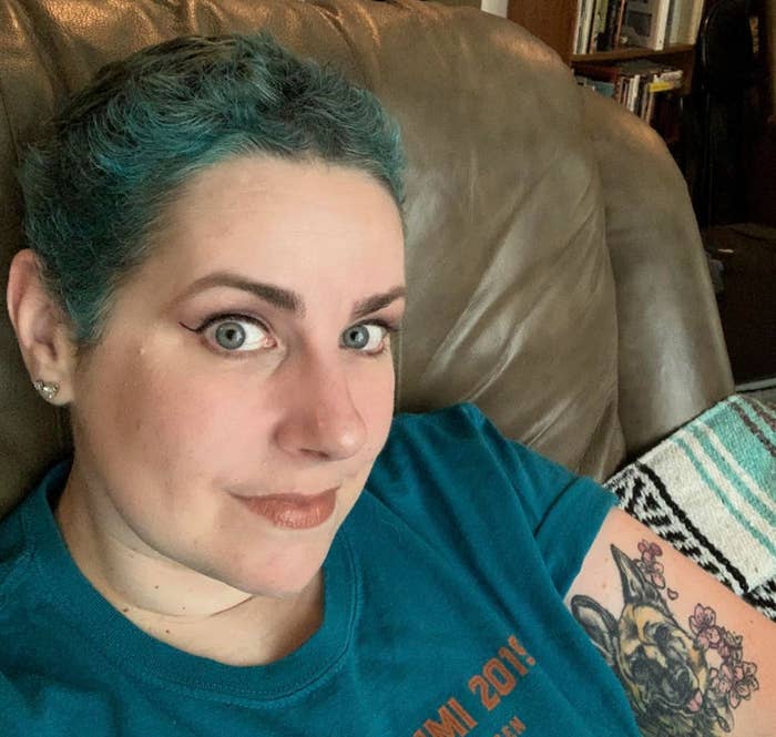 The author dyed her hair teal as it grew out after chemotherapy