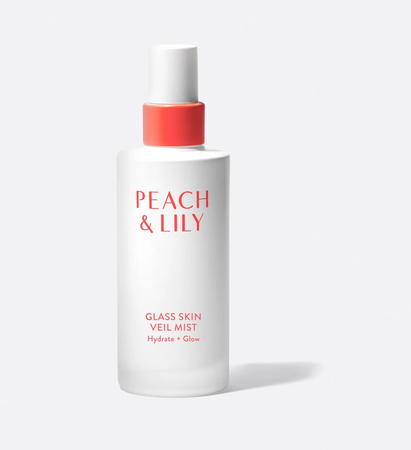 Peach & Lily Glass Skin Veil Mist bottle shown, labeled "Hydrate + Glow," for a dewy complexion
