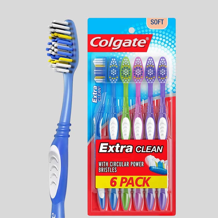 Colgate Extra Clean toothbrushes, brushed  6-pack, with circular powerfulness  bristles for effectual  cleaning. Packaging shown with multicolored brushes