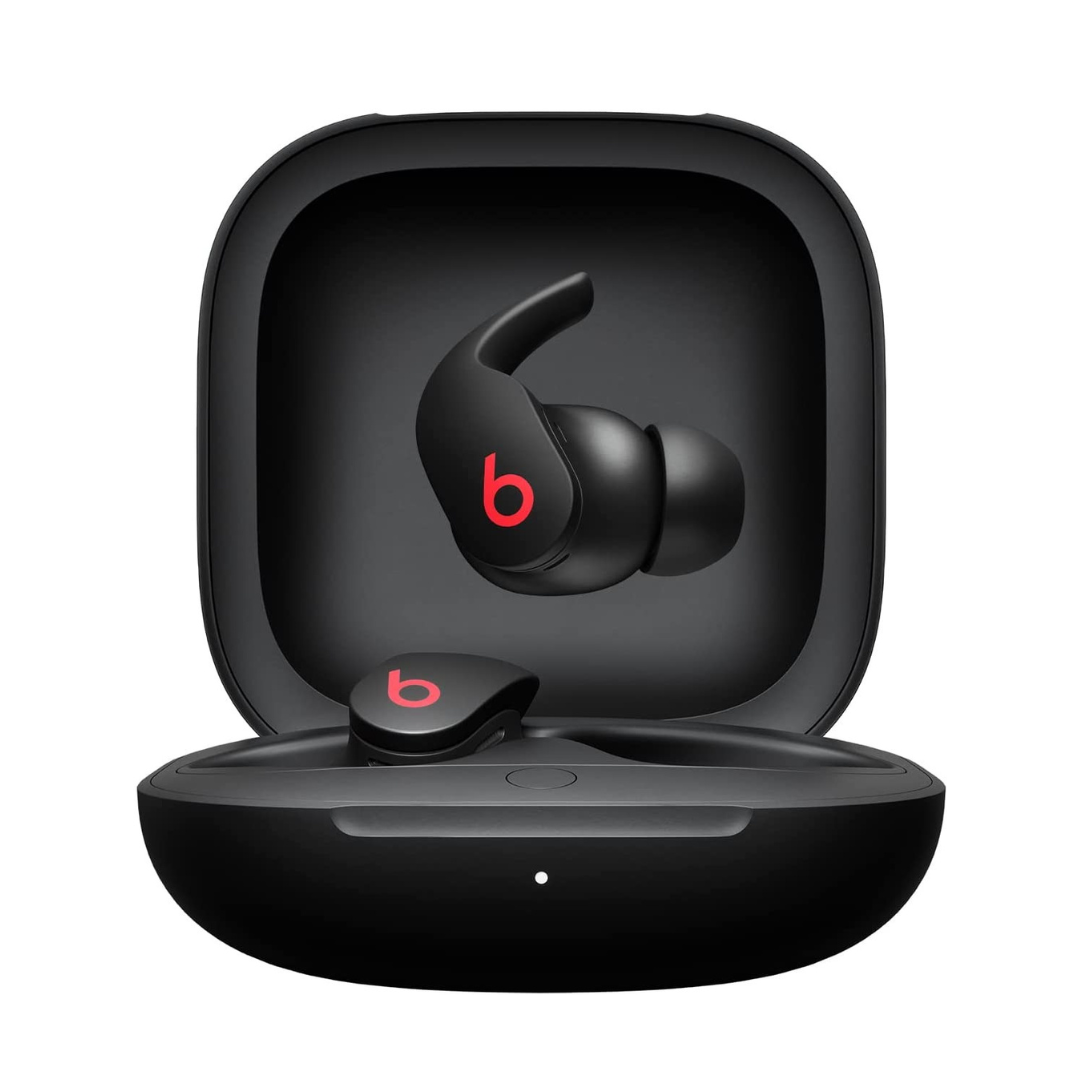 Black wireless earbuds with receptor  hooks successful  an unfastened  charging case, showcasing the Beats logo.
