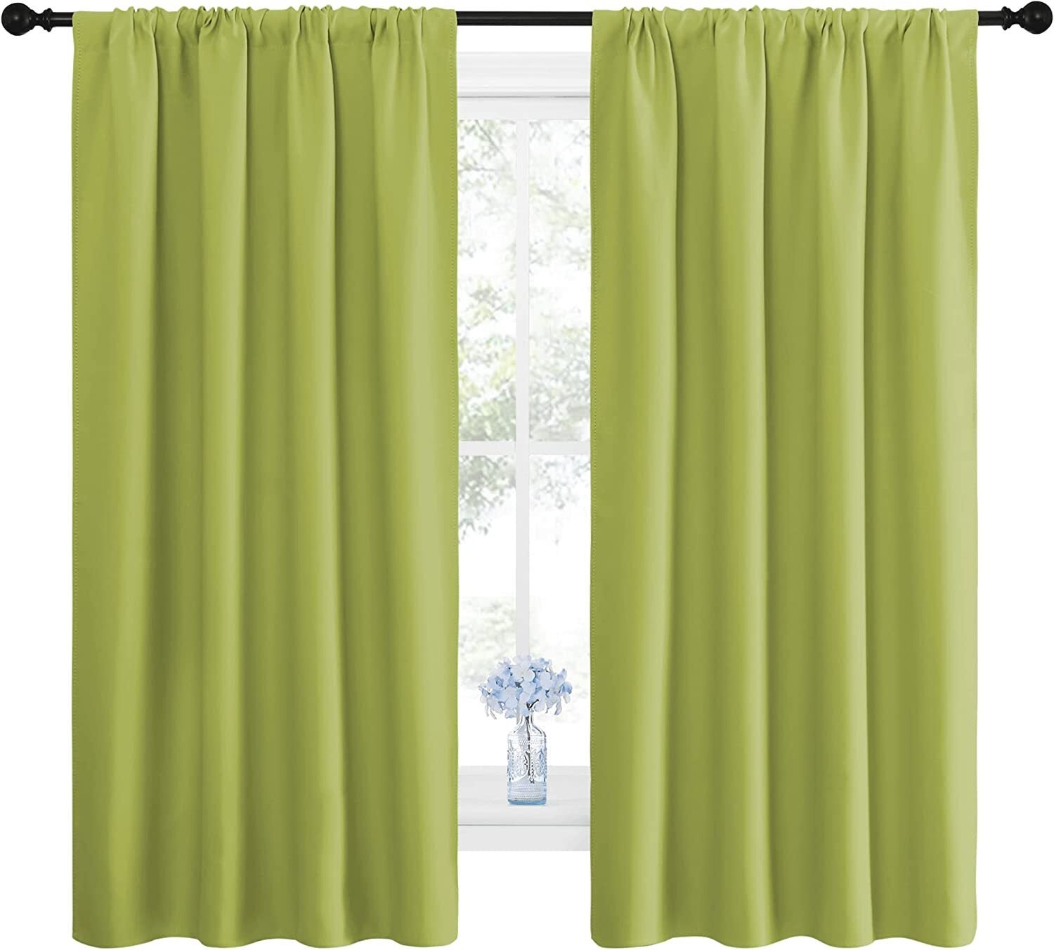 Light-blocking curtains bent  connected  a rod successful  beforehand   of a model   with a vase of flowers connected  the sill. Designed for country   darkening and privacy