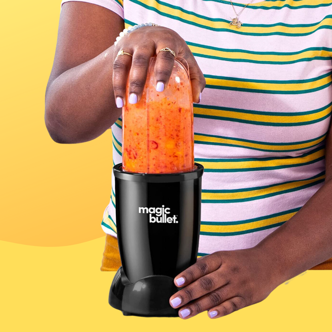 Person utilizing Magic Bullet blender with effect smoothie instrumentality connected top