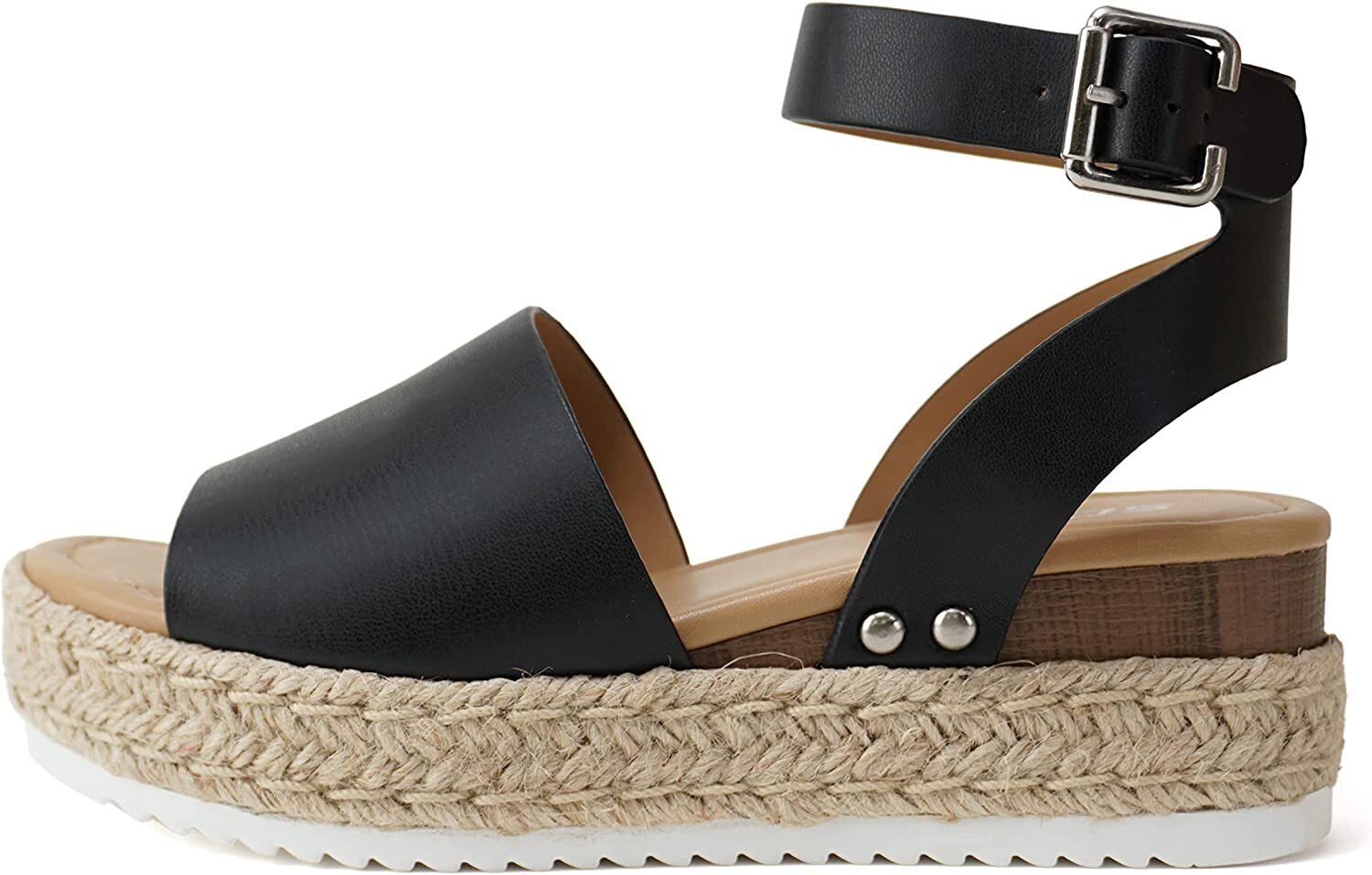 Black espadrille wedge sandal with ankle strap on a white background