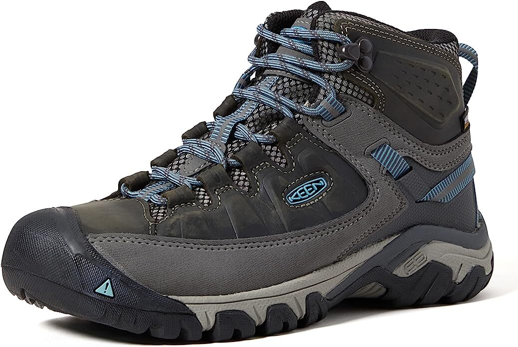 Hiking boot featuring durable upper design with secure lace-up system