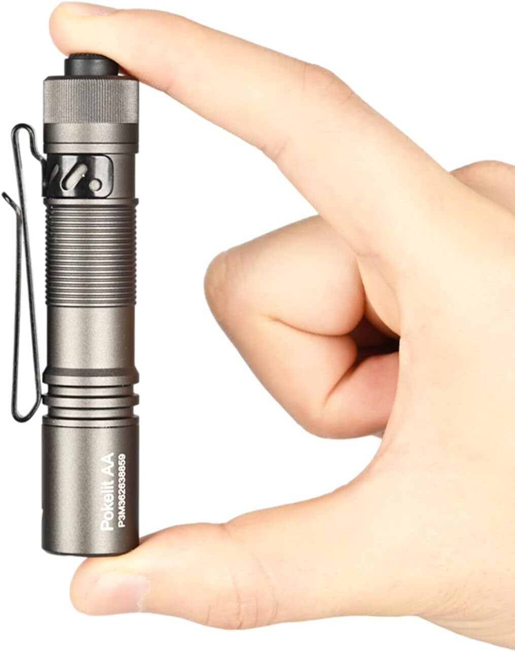 A manus  holds a compact flashlight, highlighting its tiny  size and portability, suitable for buying  consumers funny   successful  applicable  gadgets