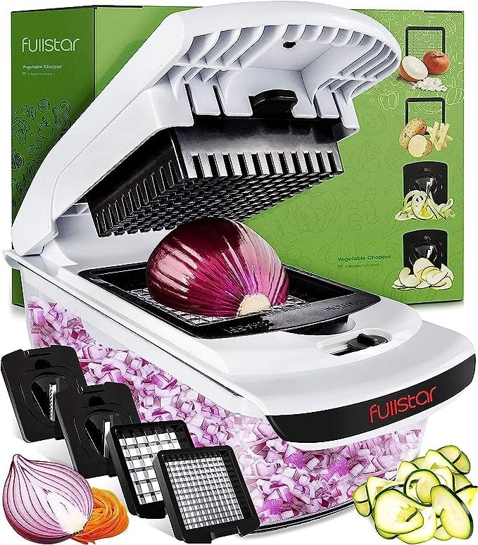 Vegetable chopper slicing onions with various blades and accessories displayed