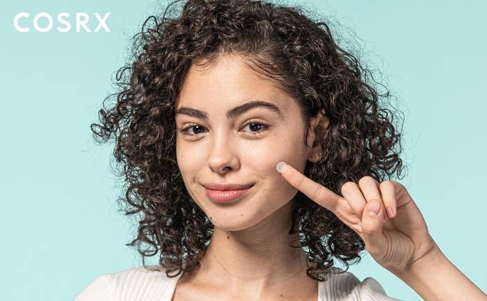 model wearing Cosrx pimple patches