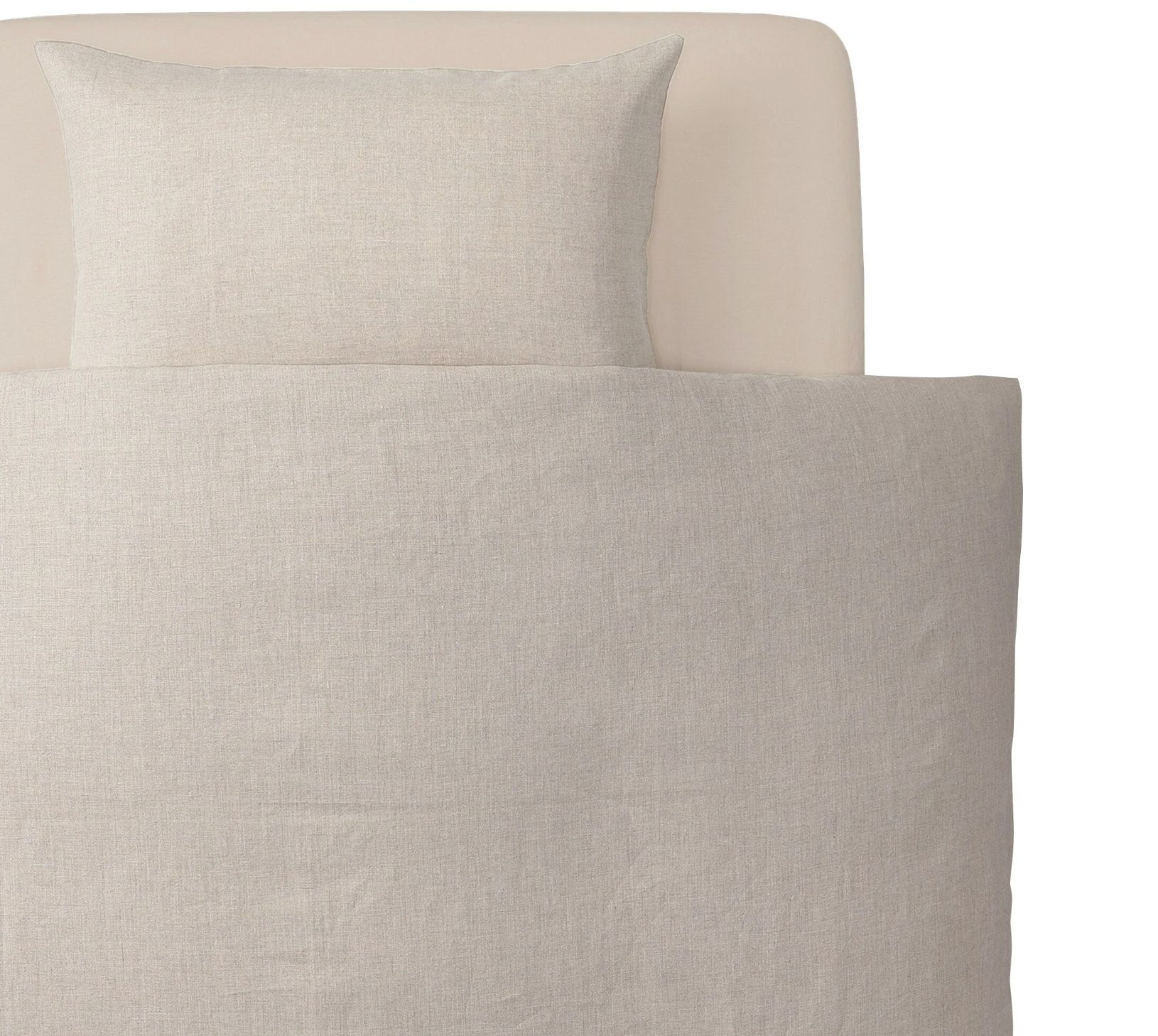 Bed with neutral linen bedding set