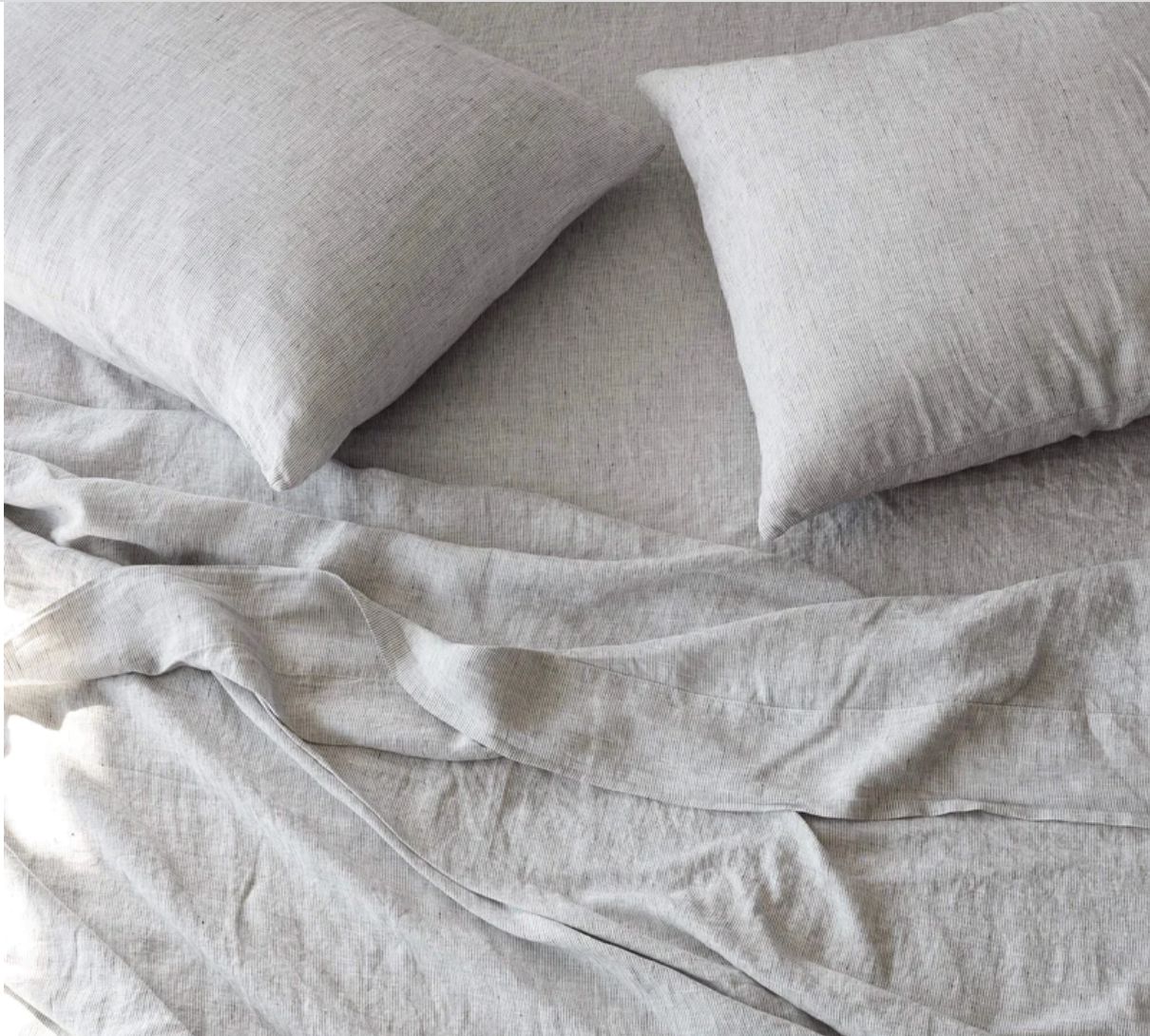 Neutral-toned bedding with pillows