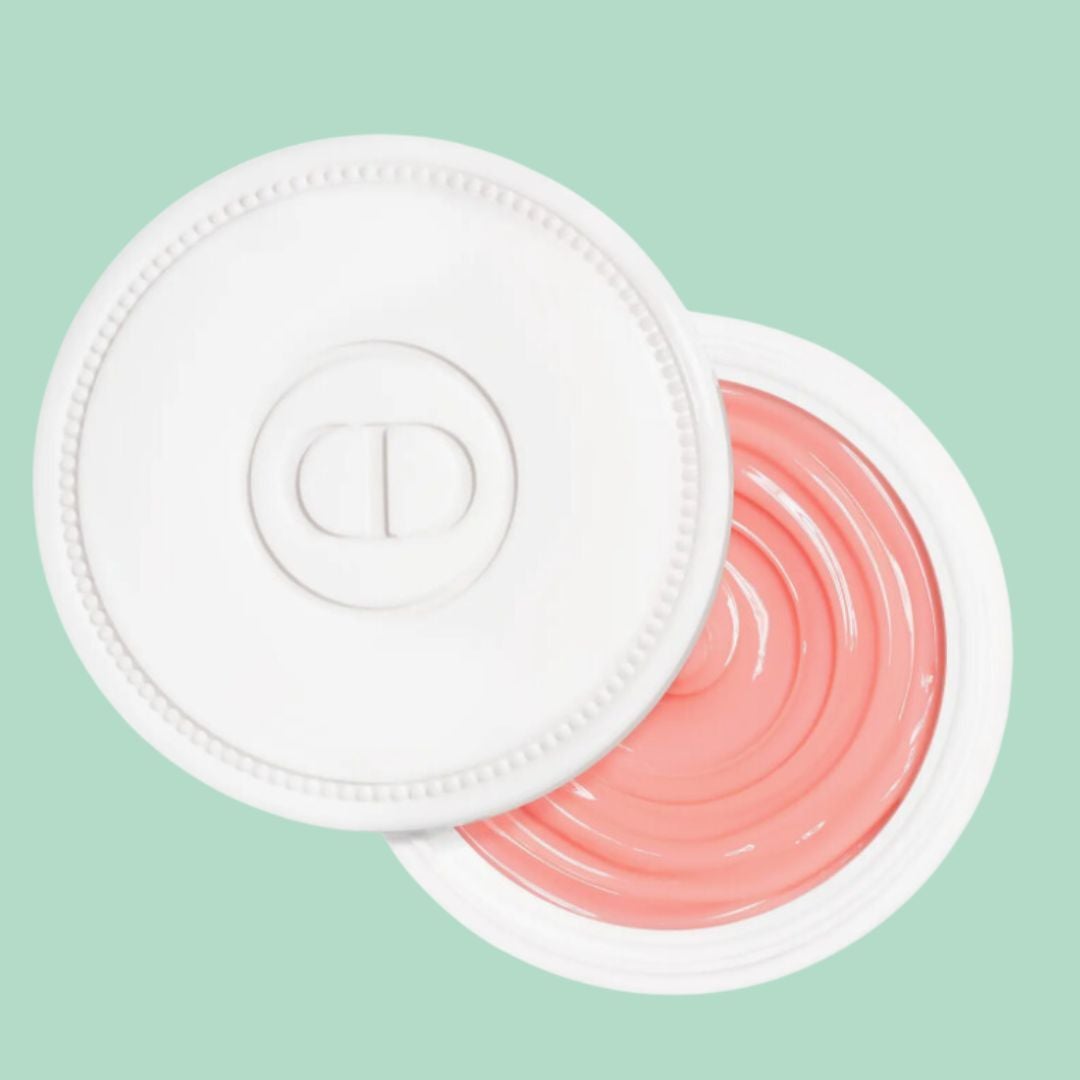 Open jar of pick with a circular swirl plan connected the lid, displayed connected a plain background